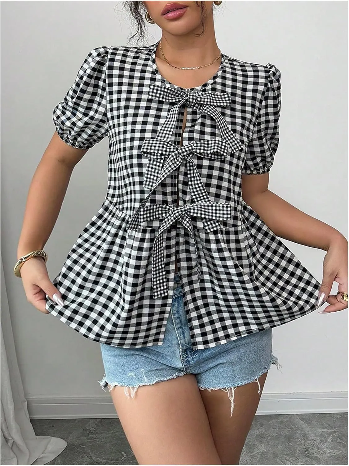 WDIRARA Women's Floral Print Bow Tie Front Blouse Puff Short Sleeve Round Neck Peplum Babydoll Shirt