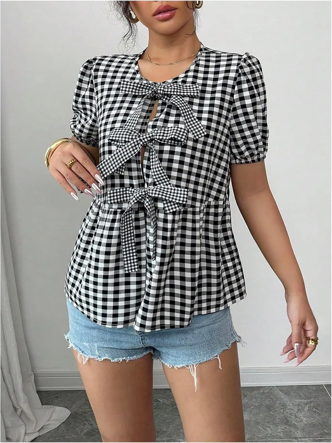WDIRARA Women's Floral Print Bow Tie Front Blouse Puff Short Sleeve Round Neck Peplum Babydoll Shirt