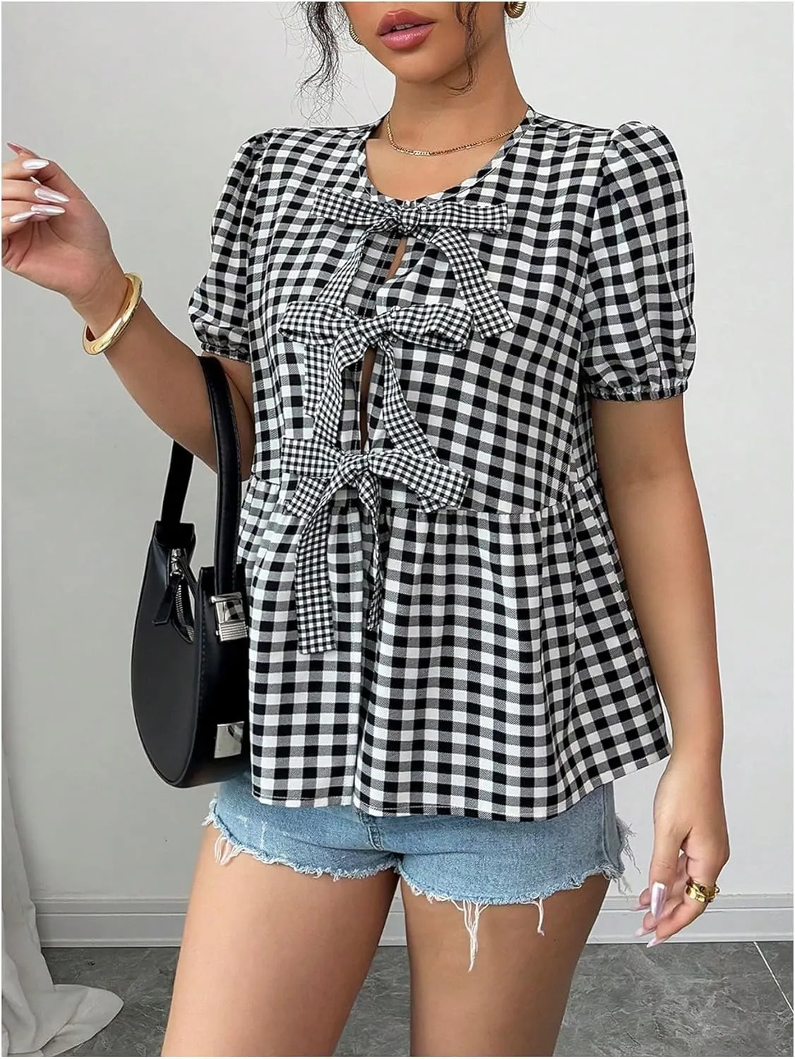 WDIRARA Women's Floral Print Bow Tie Front Blouse Puff Short Sleeve Round Neck Peplum Babydoll Shirt