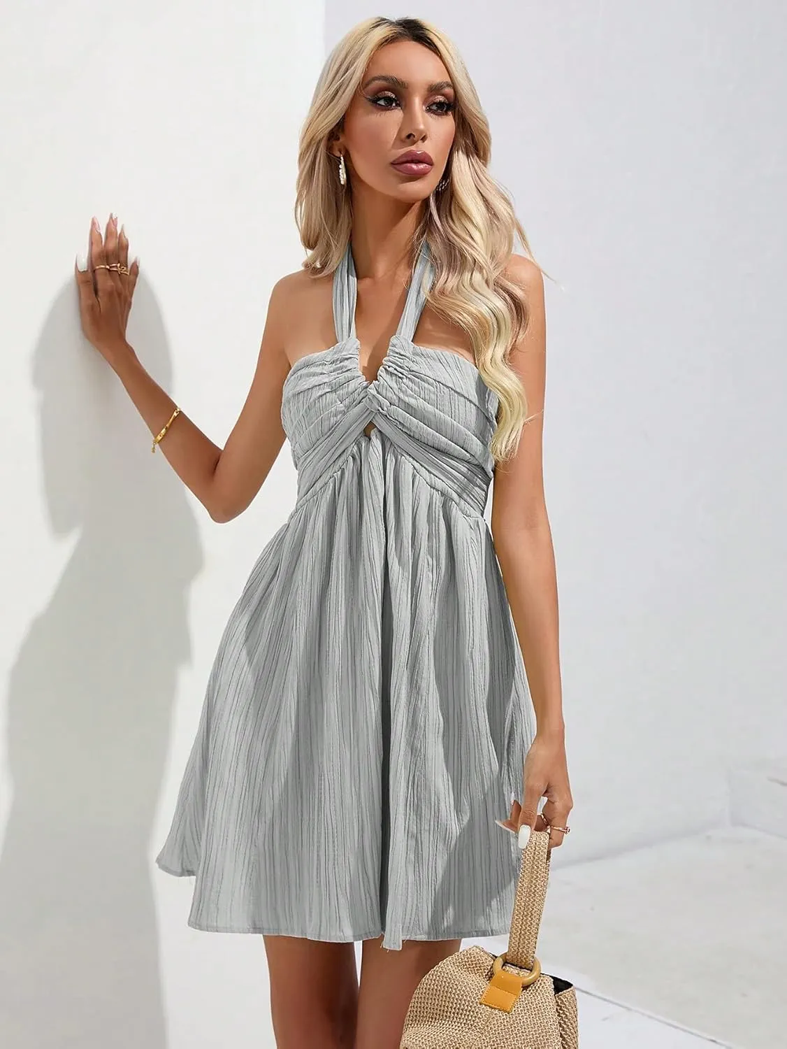 WDIRARA Women's Halter Tie Backless Smocked A Line Flowy Summer Vacation Mini Dress